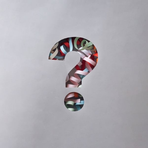 festive-question-mark-cutout-with-twirled-party-st-2026-01-06-10-43-42-utc