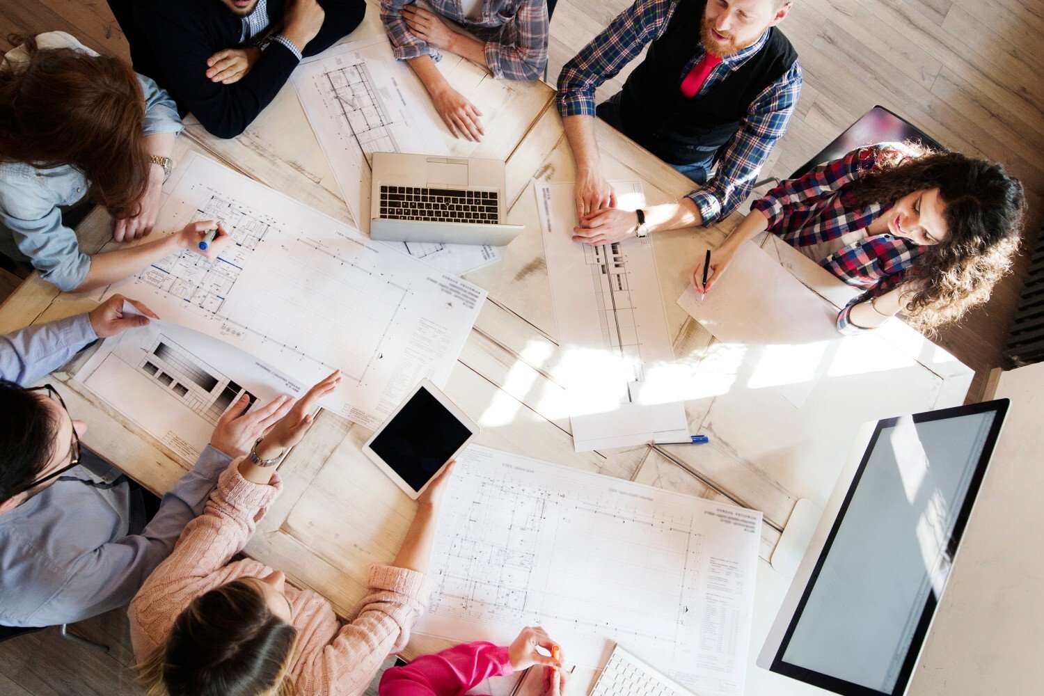 portrait-of-young-perspective-designers-having-mee-2026-01-09-08-25-45-utc